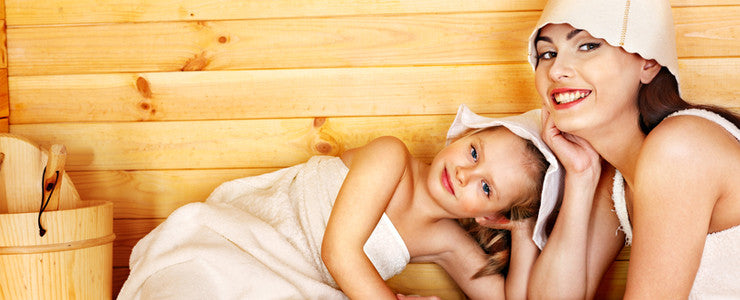 Mother and child in sauna